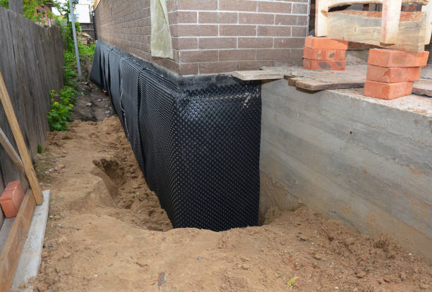 Happy homeowners after waterproofing job in Bangor